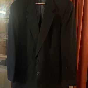 Men’s faint pinstripe suit. Dark navy. No wear or tear. Has been dry cleaned